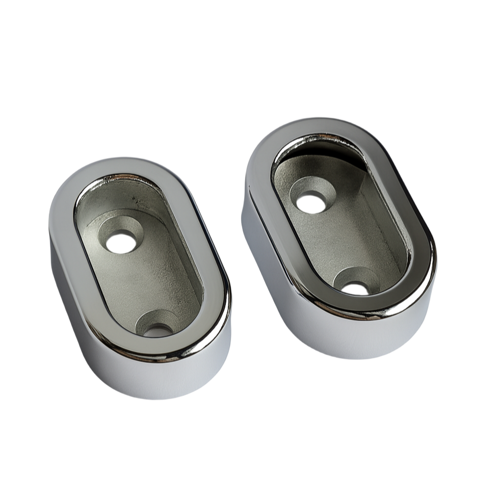 Two chrome oval concealed fix sockets on a white background