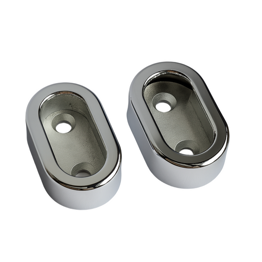 Two chrome oval concealed fix sockets on a white background
