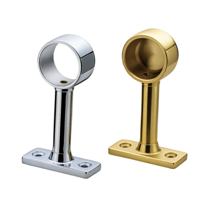 Silver and gold metal brackets on a white background