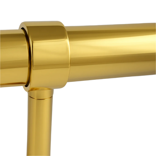 Gold metal bar with a cylindrical design on a gray background